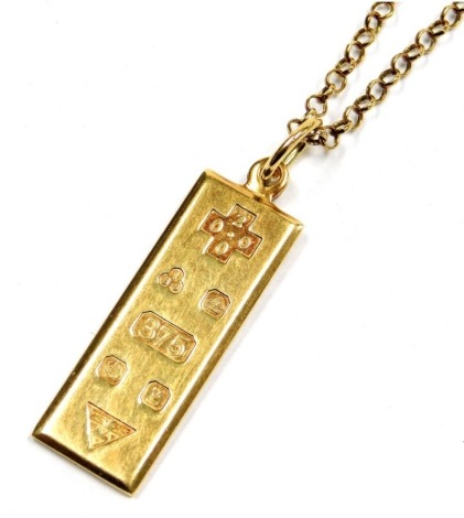 A 9ct gold Millennium ingot, on a 9ct gold belcher link neck chain, 12.9g.