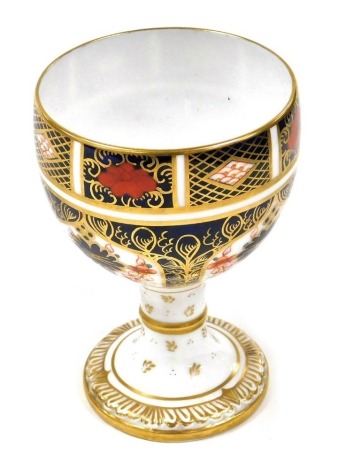 A Royal Crown Derby porcelain Old Imari pattern goblet, number 1128, 12cm high.