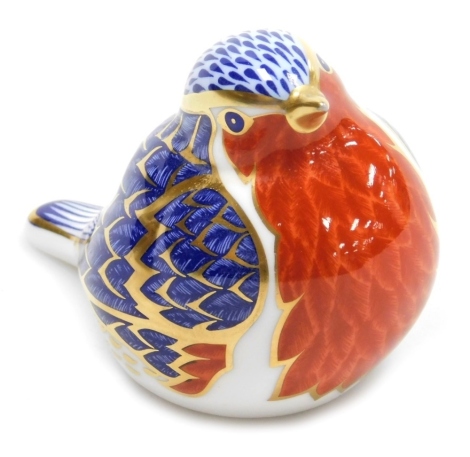 A Royal Crown Derby porcelain robin paperweight, silver stopper and red printed marks, 7cm high, boxed.