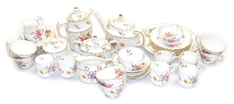 A group of Royal Crown Derby porcelain Derby Posies tea wares, to include teapot, hot water jug, two handled sugar bowl, tea strainers, teacups and saucers, etc. (a quantity)