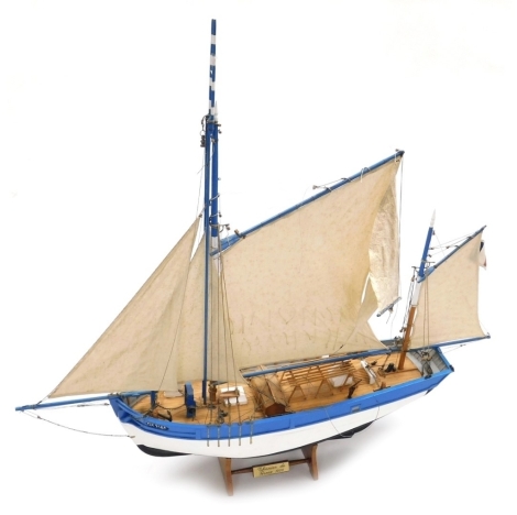 A model fishing boat of the Thoniede Groix 1908, on a hardwood stand bearing name plaque, 70cm high overall, 72cm wide.