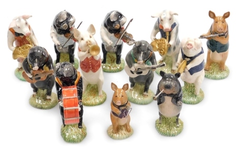 A ten piece Beswick pottery pig band, comprising Daniel PP5, John PP1, James PP7, Richard PP8, Daniel PP5, Christopher PP9, Michael PP6, Andrew PP4, Benjamin PP12, David PP3, Thomas PP11, Matthew PP2, each with printed marks.