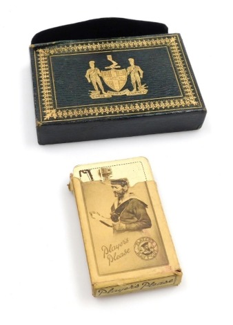 Two packs of early 20thC Worshipful Company of Playing Cards playing cards, contained in a green morocco leather and gilt tooled case, bearing coat of arms and motto for the Worshipful Company of Playing Cards, the case 14cm wide, together with a pack of 