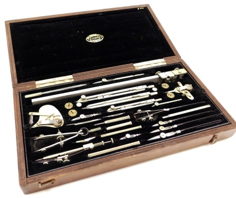 A set of early 20thC Ecobra of Nurnberg drawing instruments, cased, 35.5cm wide.