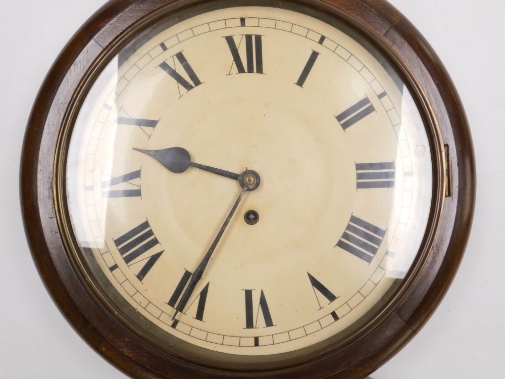 A 19thC oak cased railway clock, the cream enamel dial bearing Roman ...