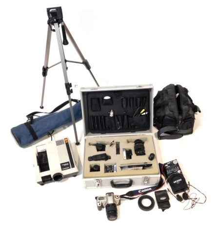 A group of camera and related equipment, to include a Canon EOS300 camera, various camera bags, a Canon 75x300mm lens, an aluminium camera case, tripod, a Hanimex Rondette 1500RF projector, etc. (a quantity)