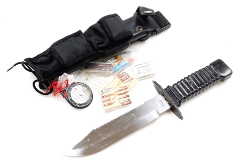 A Taiwanese survival knife, with a steel blade, in a sheath with belt attachment, 34cm wide.