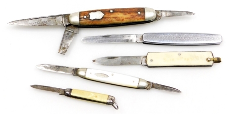 A George Wostenholm steel bladed knife, horn bound, mother of pearl bound knife, stainless steel fruit knife, pocket knife engraved to the faux mother of pearl casing with St-Raphael, and one further pocket knife. (5)