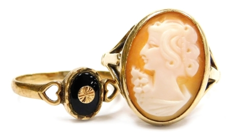 A 9ct gold and shell cameo ring, bust portrait of a lady, size P, and a 9ct gold and black onyx lady's ring with pierced heart shaped shoulders, size K, 5.5g.