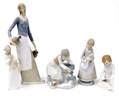 Five Lladro style porcelain figures, comprising figure of a female water carrier, 40cm high, child reading, child holding lamb, child holding doll, and figure of a girl seated.