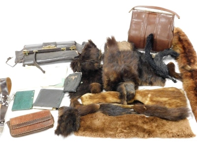 A group of lady's handbags, furs etc., to include an early 20thC brown leather handbag, with brass and Perspex clasp, a brown leather Gladstone style bag, various furs, a brown leather Girl Guide belt, leather wallets, etc.