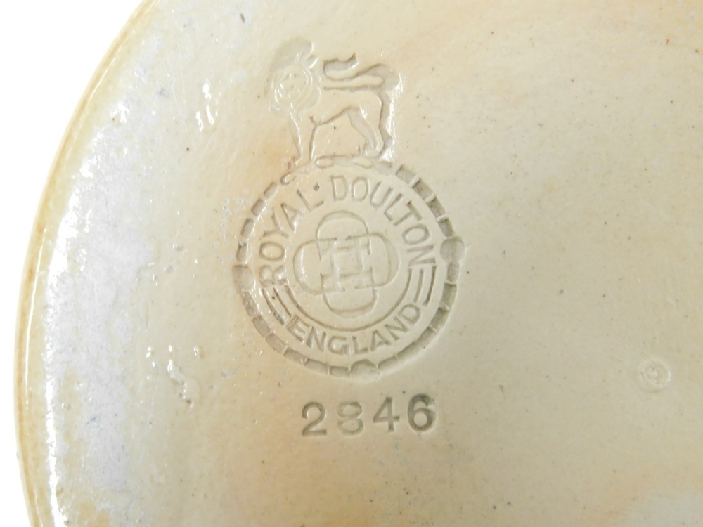 A Royal Doulton stoneware jug, with relief moulded decoration depicting