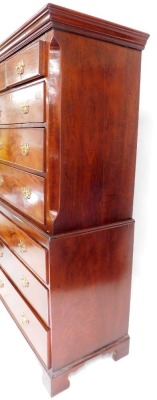 A George III mahogany chest on chest, the out swept pediment over two short above six long drawers, raised on bracket feet, 175.5cm high, 110cm wide, 51cm deep. - 2