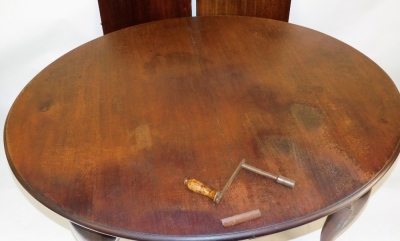 A Victorian mahogany extending dining table, the oval moulded top raised on four ball and claw feet, with two leaves, 74cm high, 146cm wide, 156cm extended, 117cm deep. - 2