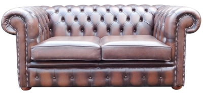 A modern brown leather two seater Chesterfield sofa, 163cm wide.