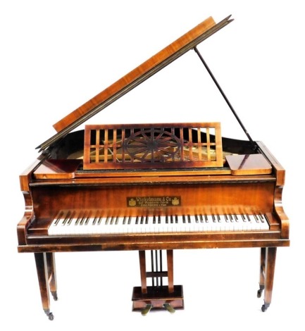 An early 20thC boudoir grand piano by Winkelmann and Co, in a mahogany and rosewood case, supported on three twin square tapered legs.