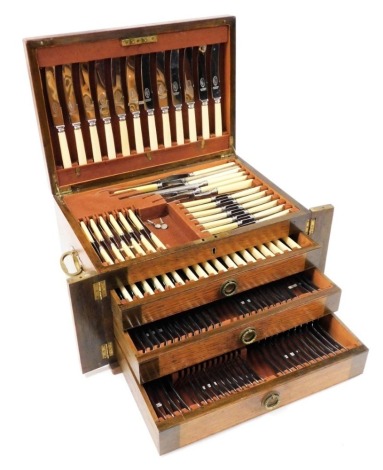 An early 20thC Staybrite stainless steel canteen of cutlery, in a three drawer chest with hinged upper section, chest 27cm high, 45cm wide, 32cm deep.