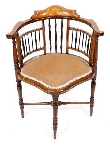 A Victorian mahogany and inlaid tub chair, with scrolling arms, spindle back, and a shaped seat, raised on turned legs, united by an X frame stretcher, 58.5cm wide.