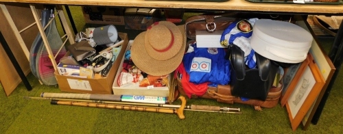 General household effects, to include dolls in world dress, Manchester United football club shirt, Grimsby Town football club shirt, hockey stick, tennis rackets, sun hats, etc. (a quantity) Buyer Note: WARNING! This lot contains untested or unsafe electr