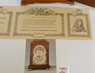 A Christiaan Huygens burr walnut table clock, the oval brass dial with silvered chapter ring bearing Roman numerals, date day apertures, the upper phase with month and astrological dial, fronted by a constellation dial, chapter ring showing the comparable - 8