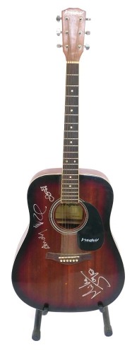 A Westfield guitar, model B200-SB, on guitar stand, with silver marker signatures relating to The Smiths, 115cm high overall.