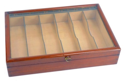 A Victorian mahogany glove display box, with a glazed top with six internal sections, ranging in size from 6¾ to 8, 9cm high, 40cm wide, 28cm deep.