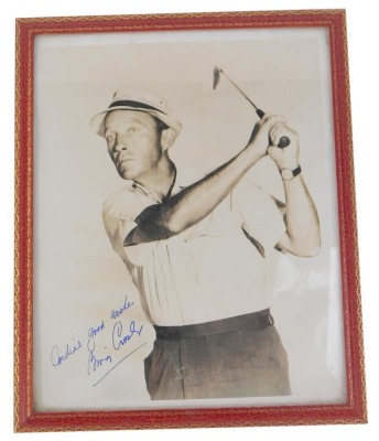 A Bing Crosby golfing black and white photograph, bearing biro signature 'Good Wishes Bing Crosby', framed, 27.5cm x 22.5cm.