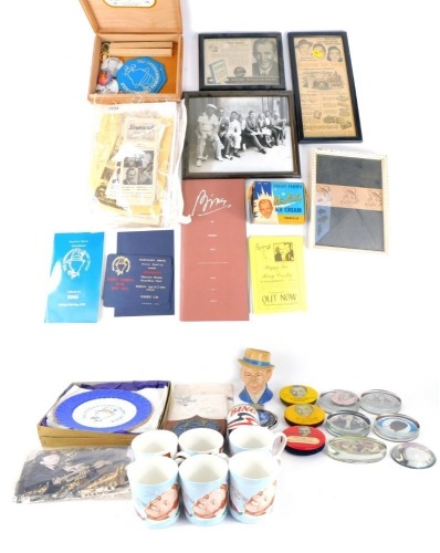 A collection of Bing Crosby ornaments and trinkets, a Bing golfing handkerchief, "To Burt Day", signed Bing Crosby, black and white photographs, a small ceramic head, International Crosby Circle plate, plaque, mugs, paperweights, Bing Crosby Ice Cream Van