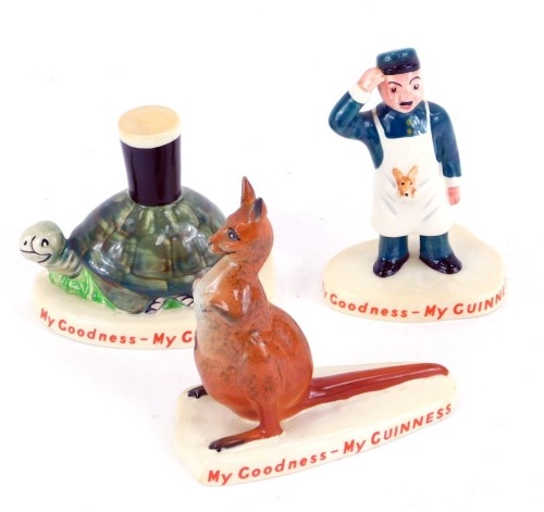 Three Carlton Ware My Goodness My Guinness figures, comprising Kangaroo, Turtle and Guinness, and Gentleman in blue suit with dog, 10cm, 9cm and 10cm high respectively. (3)