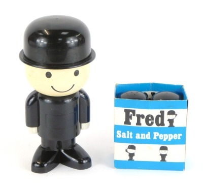 A Homepride Fred storage jar, 22cm high, and matching salt and pepper pots, 11cm, boxed. (3)