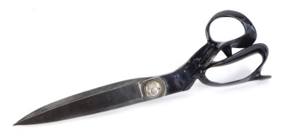 A pair of early 20thC dress making scissors, 35cm long.