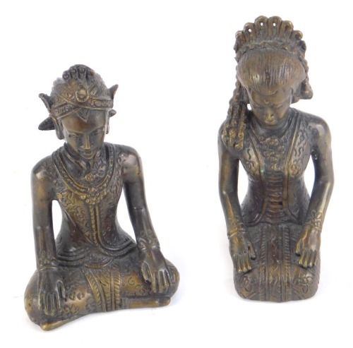 A pair of Eastern bronzed figures, each of a seated Goddess, 10cm high.