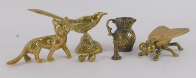 A group of brass wares, comprising a seated bird, fox, fly trinket box, miniature thistle shaped jug, miniature bugle and candlestick. (6) - 2