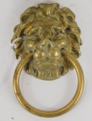 Two 20thC brass door knockers, each formed as a lion's mask and ring handle, 20cm and 11cm high. (2) - 2