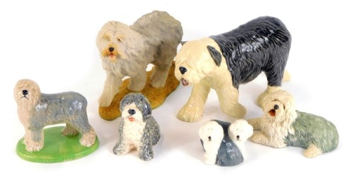 A group of Old English Sheepdog figures, comprising a Beswick Puppies figure group, a Babbacombe Devon figure, a Wade Old English Sheepdog, and three others unmarked. (6)