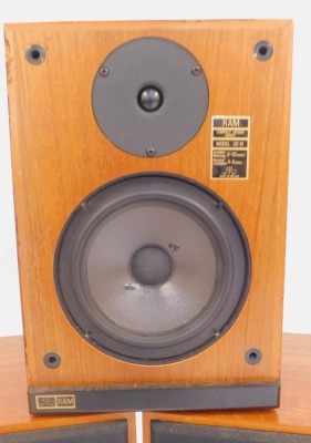 Three Ram speakers, model CD-10, each in a teak case, one lacking cover, 41cm and 33cm high. (3) - 5