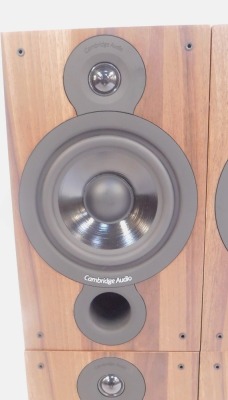 Four Cambridge Audio SX-60 speakers, serial no SS C10652 695 30252, in a walnut style case. (4) - 3