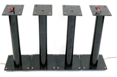 Four Norstone speaker stands, black metal finish, 62cm high.