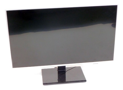 A Philips 42" flat screen television, model 43PUS7855-12, serial no FZ3A2125019082, on stand.