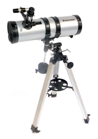 A Celestron Power Seeker 127EQ telescope, model 21049, on tripod base, with additional Barlow 3x lens and accessories, 110cm high.