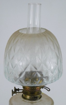 An early 20thC cut glass oil lamp, with an oval reservoir on a shaped and twist stem, on circular foot with diamond pressed shade and chimney, 59cm high. (AF) - 3