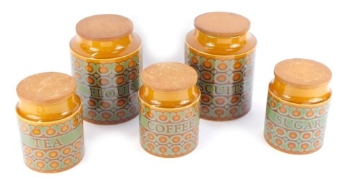 A set of five Hornsea Bronte pattern storage jars, comprising flour and biscuits, 20cm high, tea, coffee and sugar, 15cm high. (5)