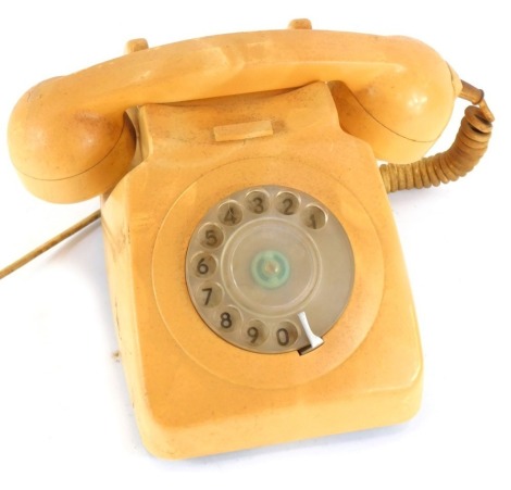 A PO Blidig vintage telephone, numbered EET8072, with a cream finish.