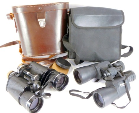 Two cased pairs of binoculars, comprising a pair of Helius Field Master Bak-4 10x50 binoculars, in material carry case, and a pair of Helkington 7x50 number 75911 binoculars, in leather carry case. (2)