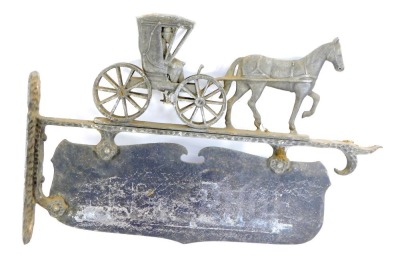 A cast metal coaching sign, depicting horse drawn carriage, with vacant base sign below, 32cm high, 43cm wide.