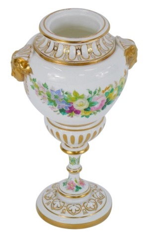 A late 19thC Copeland porcelain vase, of baluster form with gilt mask handles, gilt highlights with hand painted floral swags, blue character mark to underside, 20cm high.