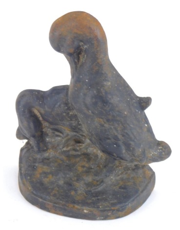 A Victorian cast iron doorstop cast as two ducks, 22cm high.