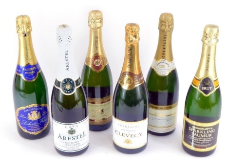 Six bottles of champagne and sparkling wine, comprising Antoini de Clevecy, a Sainsbury's Sparkling Saumur, Champagne Extra Dry by Sainsbury's, and Arestel Cava, a Comte de Beaumont, and a Champagne Laherte Freres. (6)