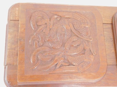 An early 20thC carved Celtic carved oak book slide, with serpent engraved panels, and moulded ends, 37cm wide, 17cm deep. - 2