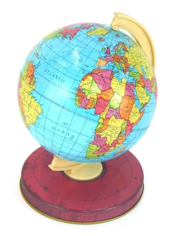 An early 20thC Chad Valley tin plate child's terrestrial globe, 20cm high.